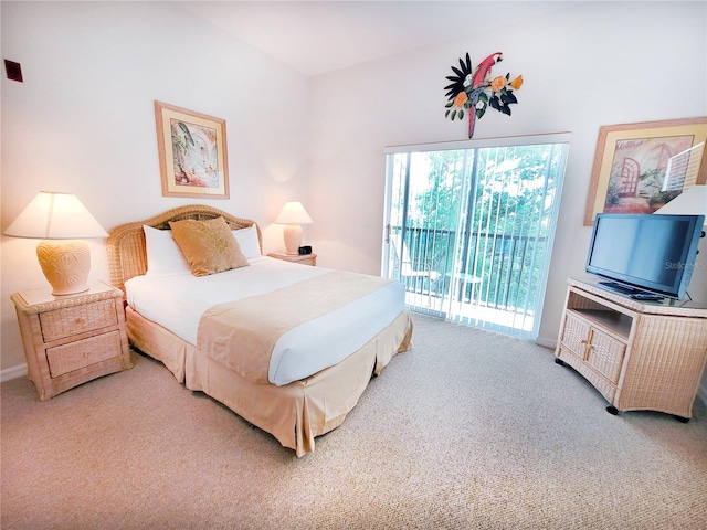 bedroom featuring light colored carpet, access to outside, and multiple windows