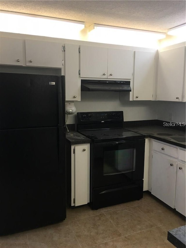 kitchen with light tile patterned floors, white cabinets, and black appliances