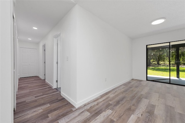 unfurnished room featuring light wood-type flooring