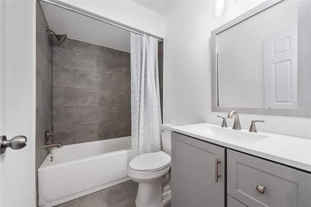 full bathroom with toilet, shower / bath combo, vanity, and tile flooring