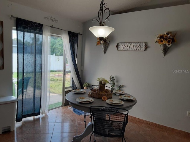 view of tiled dining space