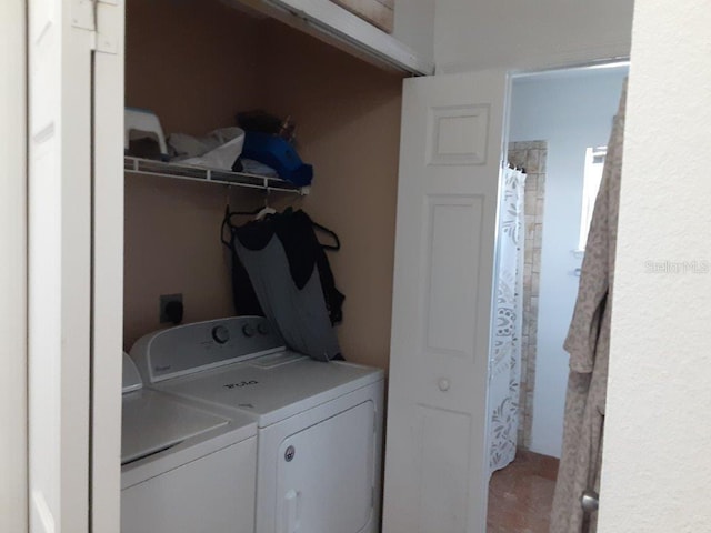 laundry area with washer and clothes dryer