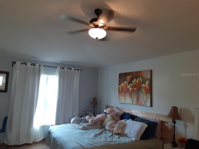 bedroom featuring ceiling fan