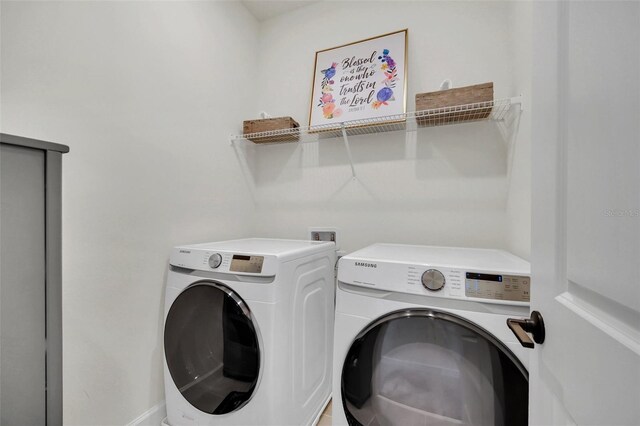 laundry area featuring washing machine and dryer