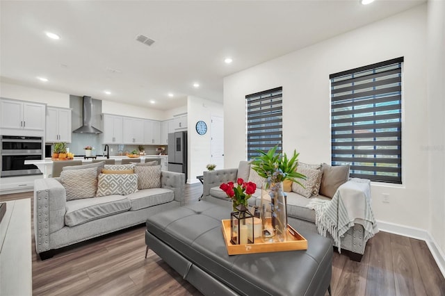 living room with hardwood / wood-style flooring