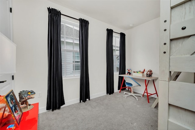 bedroom featuring light carpet