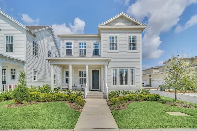 view of front of home featuring a front lawn and a porch