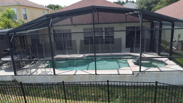 view of swimming pool with a patio and an in ground hot tub