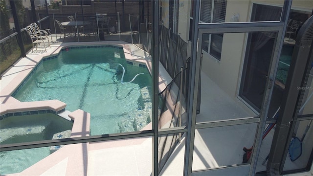 view of pool featuring a patio