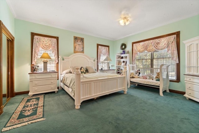 bedroom featuring dark carpet and crown molding