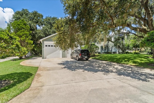 obstructed view of property featuring a front yard