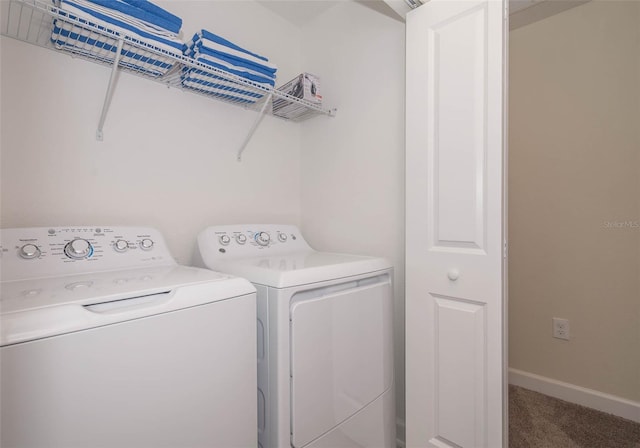 laundry area with carpet and washing machine and clothes dryer