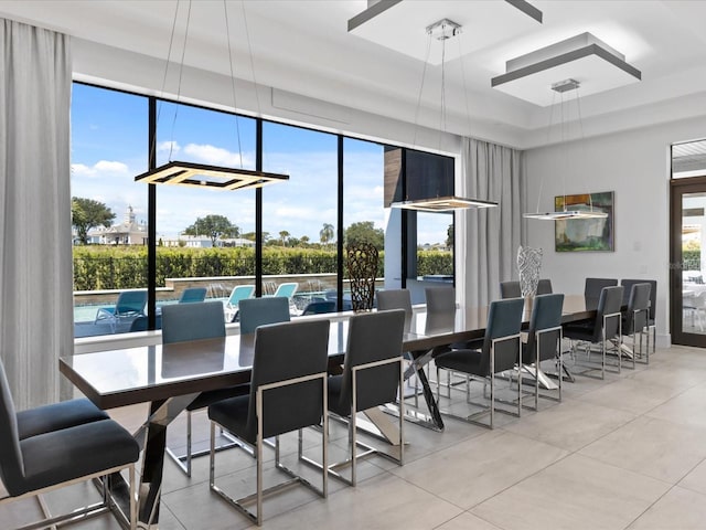 dining room featuring light tile floors