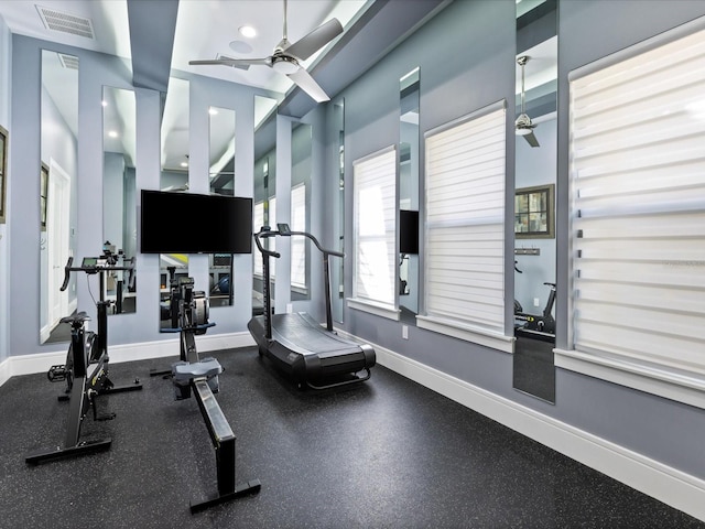 workout area with ceiling fan