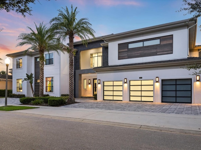 modern home featuring a garage