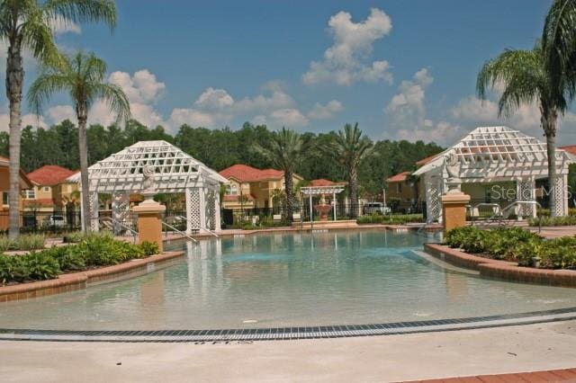 view of swimming pool with a gazebo