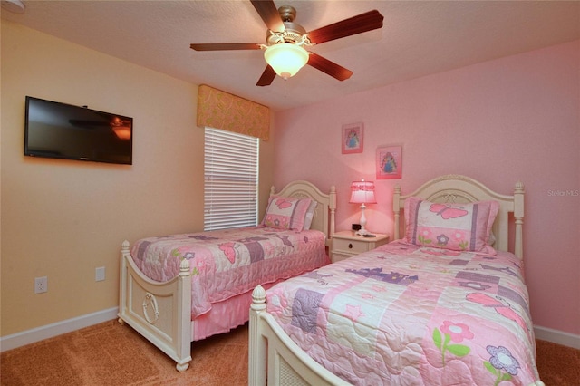 bedroom featuring ceiling fan and light colored carpet