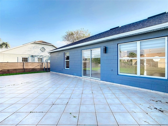 rear view of house featuring a patio