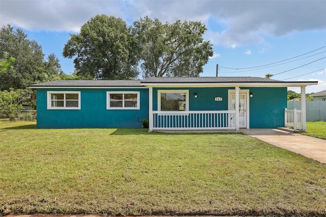 ranch-style house with a porch and a front yard