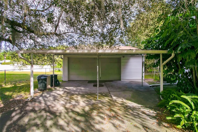 exterior space with a carport