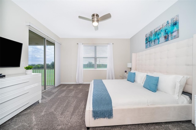 bedroom featuring dark carpet, ceiling fan, multiple windows, and access to outside