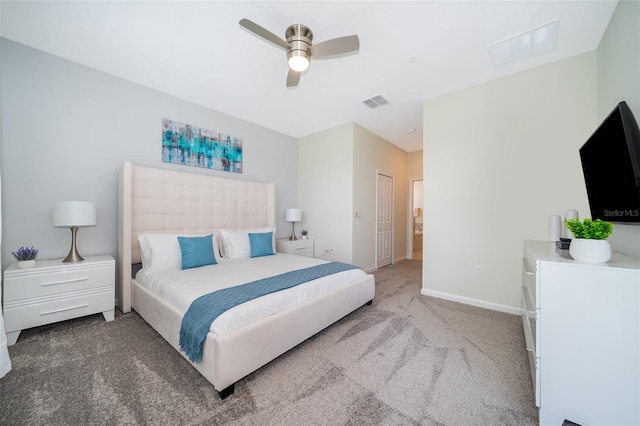 carpeted bedroom featuring a closet and ceiling fan