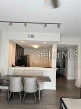 kitchen with track lighting and a breakfast bar area