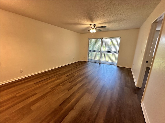 spare room featuring hardwood / wood-style floors, ceiling fan, and a textured ceiling