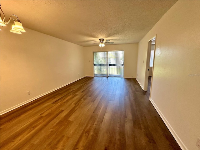 unfurnished room featuring ceiling fan, a textured ceiling, and wood-type flooring