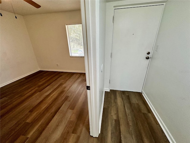 interior space with ceiling fan and hardwood / wood-style flooring