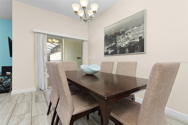 dining room with a notable chandelier