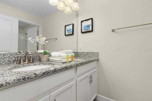 bathroom featuring double vanity