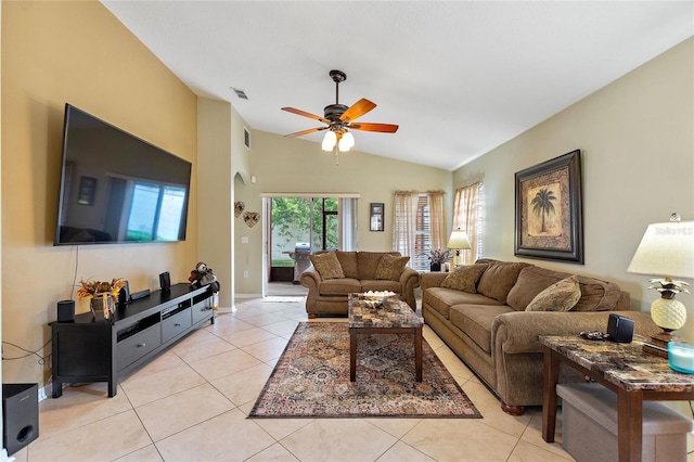 tiled living room featuring lofted ceiling and ceiling fan