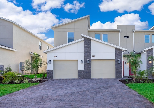 view of front of property with a garage