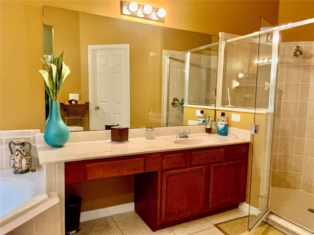 bathroom with tile patterned flooring, vanity, and separate shower and tub