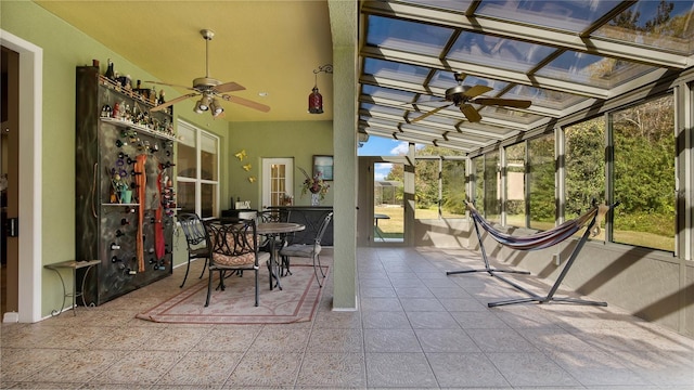 sunroom / solarium with lofted ceiling and plenty of natural light