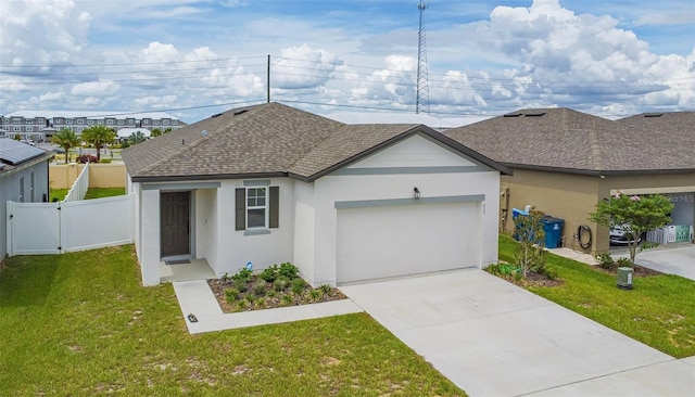 single story home with a front yard and a garage