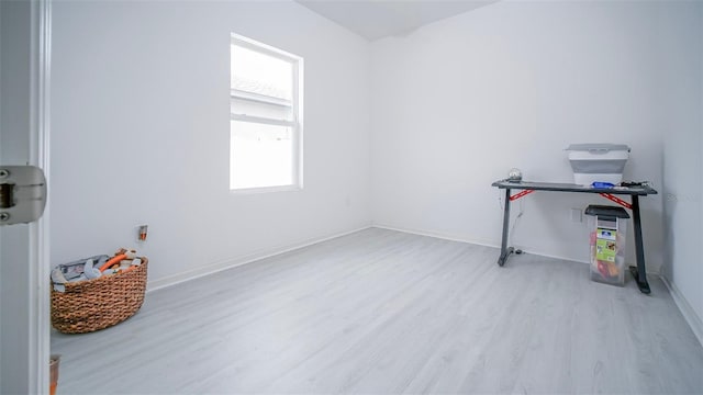 interior space featuring light hardwood / wood-style flooring and a healthy amount of sunlight