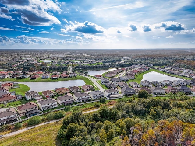 drone / aerial view with a water view