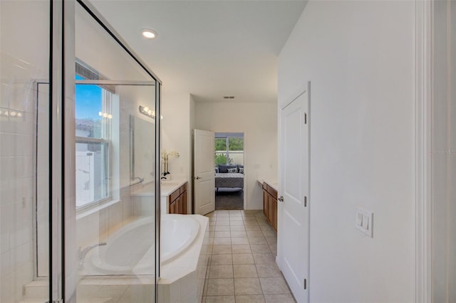 bathroom with vanity, separate shower and tub, and tile patterned flooring