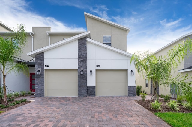 modern home featuring a garage