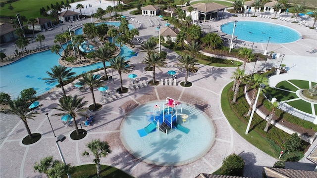 view of swimming pool with a patio