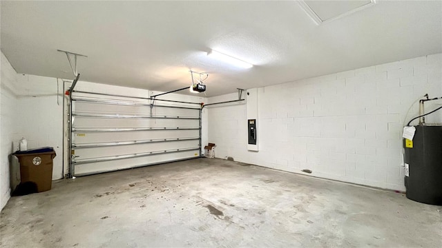 garage with electric water heater, a garage door opener, and electric panel