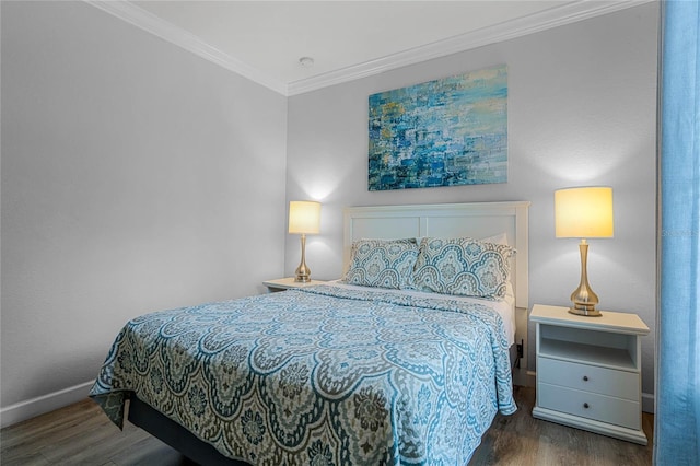 bedroom featuring ornamental molding and dark wood-type flooring