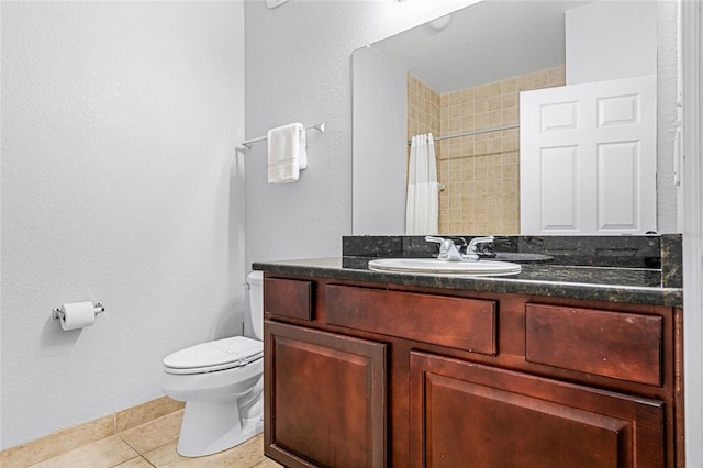 bathroom featuring tile patterned floors, vanity, toilet, and a shower with shower curtain