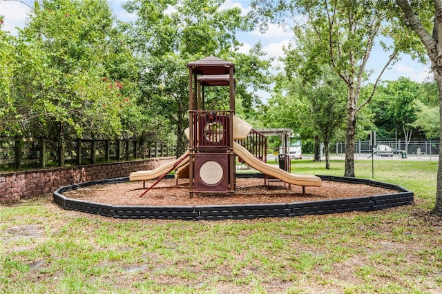 view of play area featuring a yard