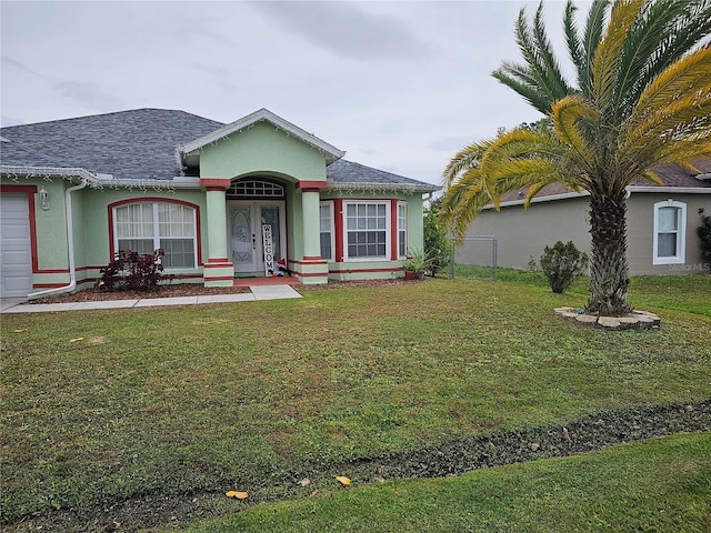 single story home featuring a front yard