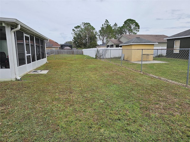 view of yard featuring a sunroom