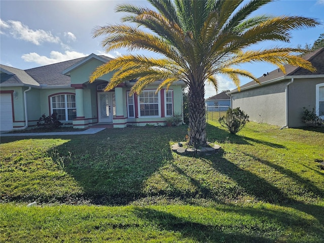 view of front facade with a front lawn