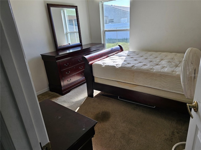 bedroom with light colored carpet